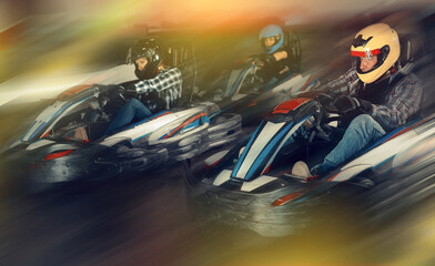 People driving go-kart cars © JackF