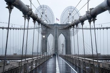 Brooklyn bridge, New York City. USA. New York in a foggy day in downtown Manhattan.