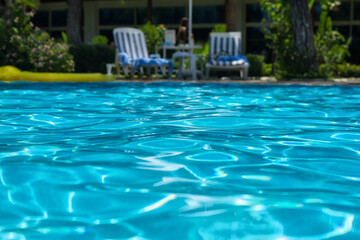 Beautiful swimming pool in hotel pool resort.