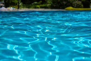 Fototapeta na wymiar Beautiful swimming pool in hotel pool resort.