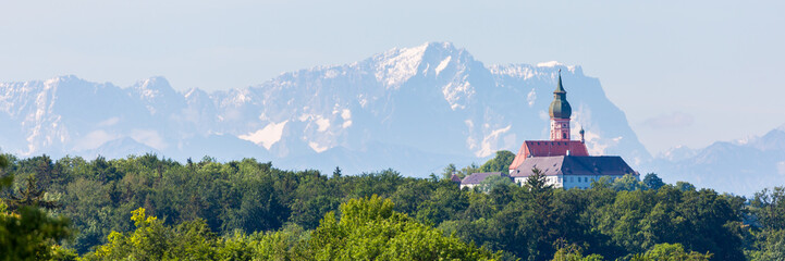 Panorama with Andechs Abbey (Kloster Andechs) and Zugspitze. - obrazy, fototapety, plakaty