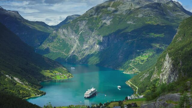 Timelapse of Geiranger fjord, Norway with cruise liner ship and boats 