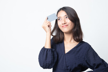 Young Asian woman think with a blank card.