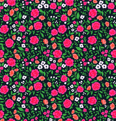 Vector seamless pattern. Pretty pattern in small flower. Small rose colour flowers. Dark green background. Ditsy floral background. The elegant the template for fashion prints.