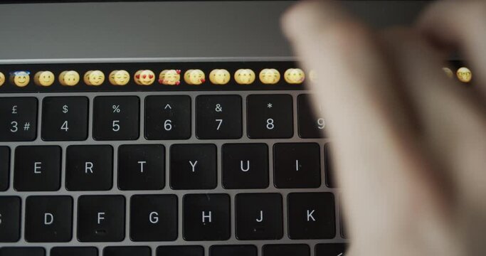 Sending emoticons from a laptop touchbar