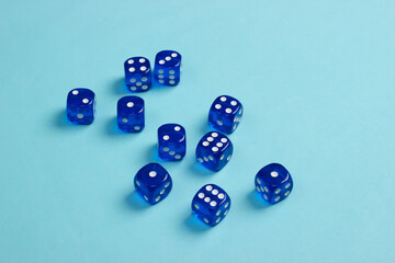 Many dice on a blue background