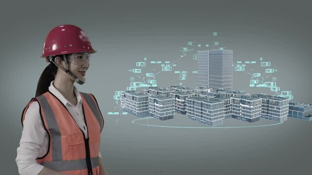 Asian female engineer using BIM model in virtual world