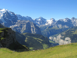 Fototapeta na wymiar Views of Swiss Alps and Lauterbrunnen Valley, seen from Mannlichen, Switzerland