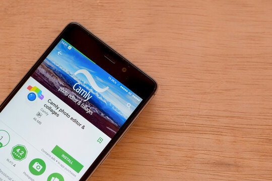 Camly photo editor & Collages dev app on Smartphone screen. Camly photo editor is a freeware web browser developed by Camly