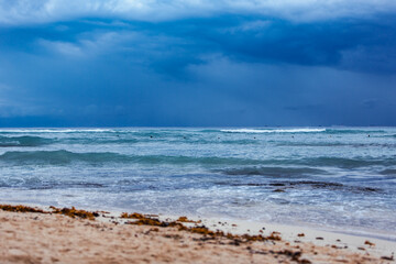 Fototapeta na wymiar dramatic sky over a sea with waves