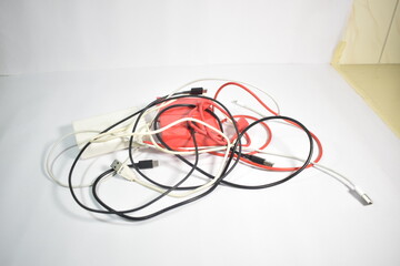 Old Broken hard drives or hard disks with wires and cables ( E-waste or technological waste) 
