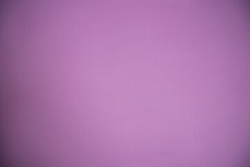 The texture of the fabric is a delicate pink color. Background, texture. The basis for a postcard. Pastel shade.