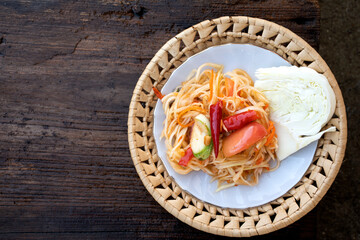 Papaya Salad on a wooden table