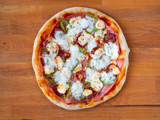 Homemade pizza with pepperoni