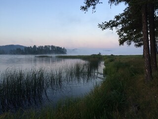 Fog at the lakeshore in the early morning