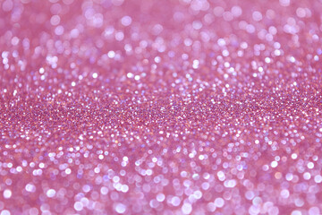 Sparkle Glitter Lights Background. Pink and Silver Colors. Shine Bokeh Effect. For party, holidays, celebration.
