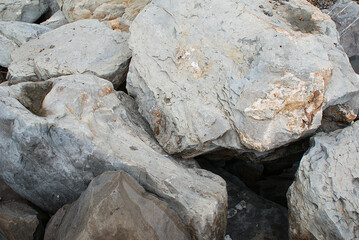 Large stones on the beach, seashore.
