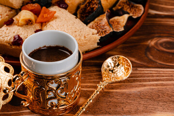 Close up photo of turkish national desserts with cup of coffee