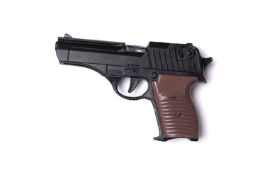 Old toy gun isolated on white background.