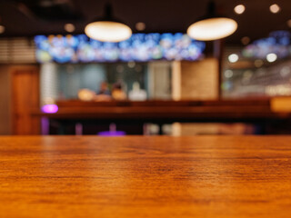Table top wooden counter Bar Restaurant lighting Blur background