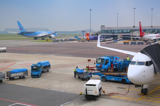 AMSTERDAM, NETHERLANDS - JULY 7, 2017: TUI, Flybe, Corendon and KLM aircraft at Schiphol Airport in Amsterdam. Schiphol is the 12th busiest airport in the world.