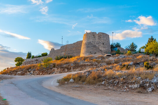 Sunset view of Lekuresi castle at Sarande, Albania