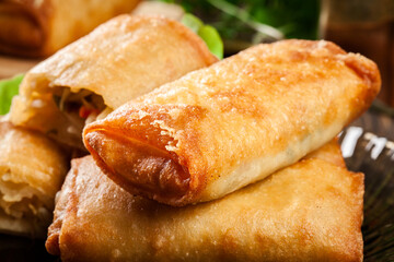 Spring rolls with chicken and vegetables served with sweet chili sauce or soy sauce