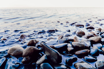 Stones in the water on the lake