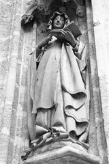 Seville cathedral saint statue. Black and white retro style.