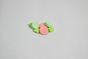 Colorful Medicine tablets on white background 