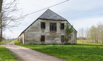 Plakat old barn style building in estonia