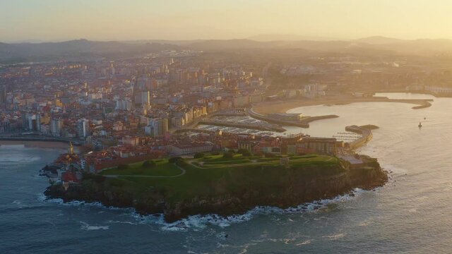 Gijon city center downtown and harbor aerial drone view in Asturias, Spain