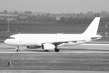 Passenger airplane. Black and white vintage filter style.