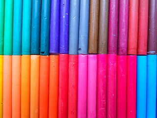 Lots of colorful wax pencils that take up the entire field of view.