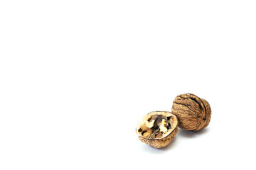 Walnuts with shell on white background