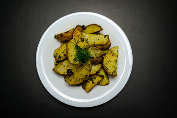 Potatoes on a black background