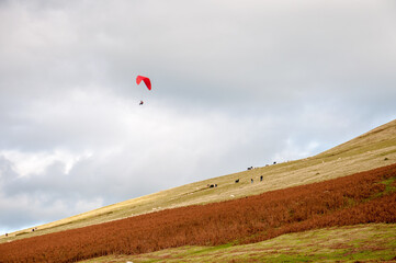 Fototapeta na wymiar Para-glider over the Black mountains of England and Wales