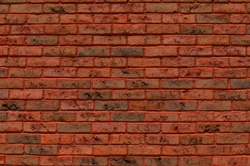 Brick running bond pattern background texture in shades of lush lava orange and red, backdrop with creative copy space, horizontal aspect