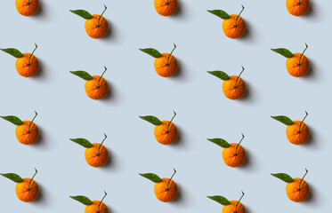 Mandarin pattern isolated on soft pastel background. Fresh fruit.