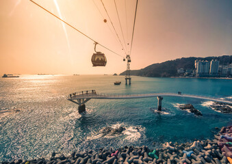 Busan city with Haeundae beach at sunset in Busan, South Gyeongsang Province, South Korea.