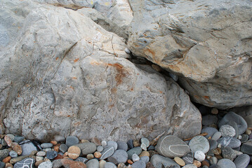 Large stones on the beach, seashore.