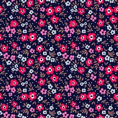 Wallpaper murals Small flowers Cute Floral pattern in the small flower. Ditsy print. Motifs scattered random. Seamless vector texture. Elegant template for fashion prints. Printing with small colorfu flowers. Dark blue background.