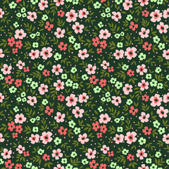 Cute floral pattern in the small flower. Ditsy print. Motifs scattered random. Seamless vector texture. Elegant template for fashion prints. Printing with small colorful flowers. Green background.