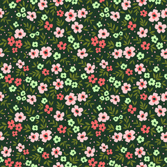 Cute floral pattern in the small flower. Ditsy print. Motifs scattered random. Seamless vector texture. Elegant template for fashion prints. Printing with small colorful flowers. Green background.