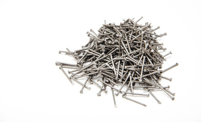 Nail. A pile of nails on a white background in macro. for text. Construction nails