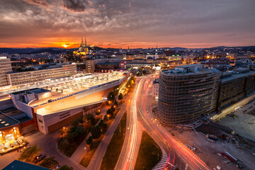 Sunset in Brno, Czech Republic. Orange sky in the city, long exposure. Beautiful sunset over a city - obrazy, fototapety, plakaty