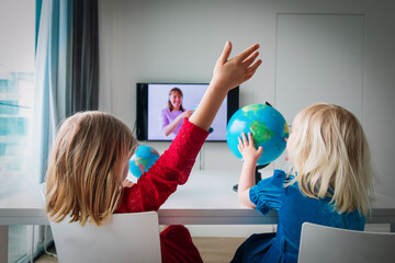 Kids learning remotely. Children having online lesson at home