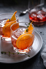 The Classic Negroni cocktail made with equal parts Gin, Campari, and Sweet Vermouth.