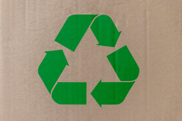 Cardboard box background with .green recycle symbol for recycling concept. World environment day.