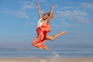 Beautiful woman enjoying summer outdoors